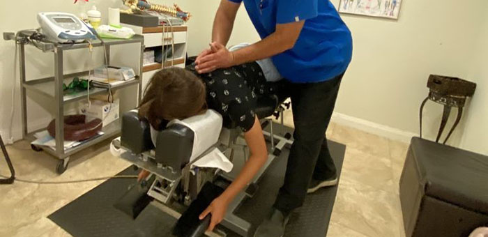 patient receiving chiropractic in La Verne