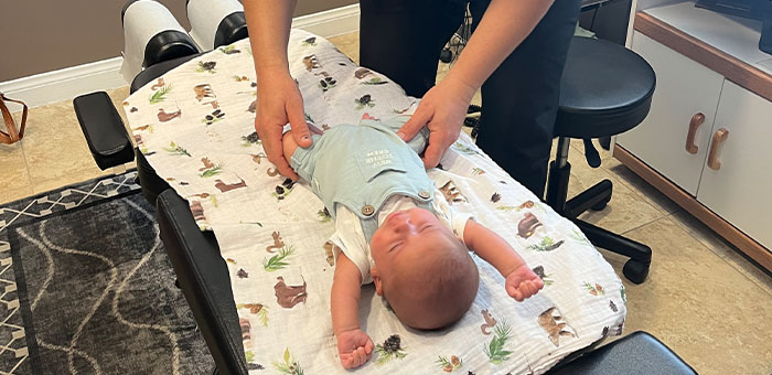 patient receiving pediatric chiropractor in La Verne