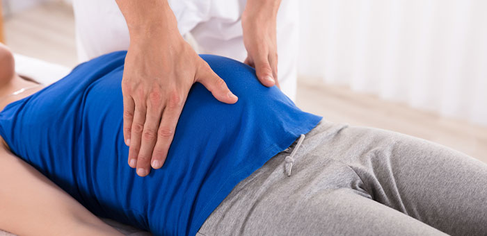 patient receiving prenatal chiropractor in La Verne
