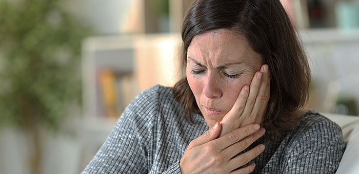 patient needing jaw pain treatment in La Verne